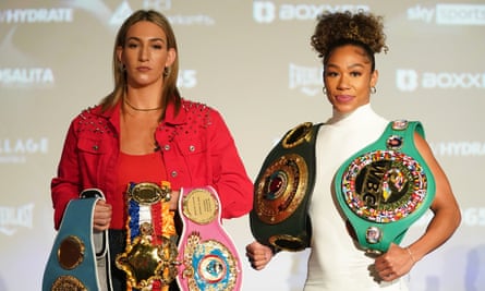 Mikaela Mayer and Alycia Baumgardner show off their belts before their fight