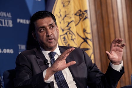 a man speaks while seated