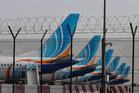 FlyDubai planes parked on the tarmac at Dubai international airport.
