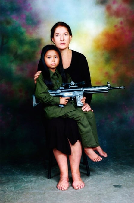 Marina Abramović with a Laos child.