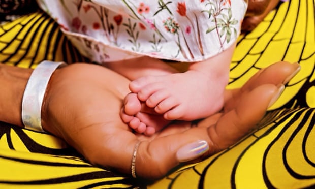 Naomi Campbell image posted on Twitter and Instagram of her hand cradling a baby's feet