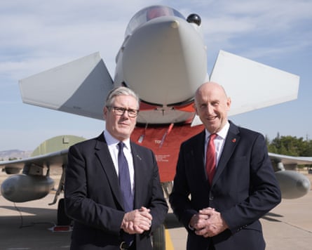 Healey and Starmer stand in front of a UK Typhoon fighter jet at Tusas airbase in Turkey, in October last year