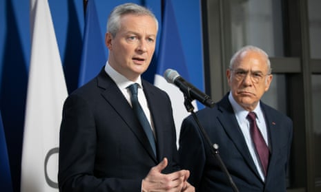 Bruno Le Maire, the French finance minister, (left) with Ángel Gurria, the secretary general of the OECD,
