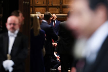 Wes Streeting speaking with colleagues in the Commons before the king's speech.