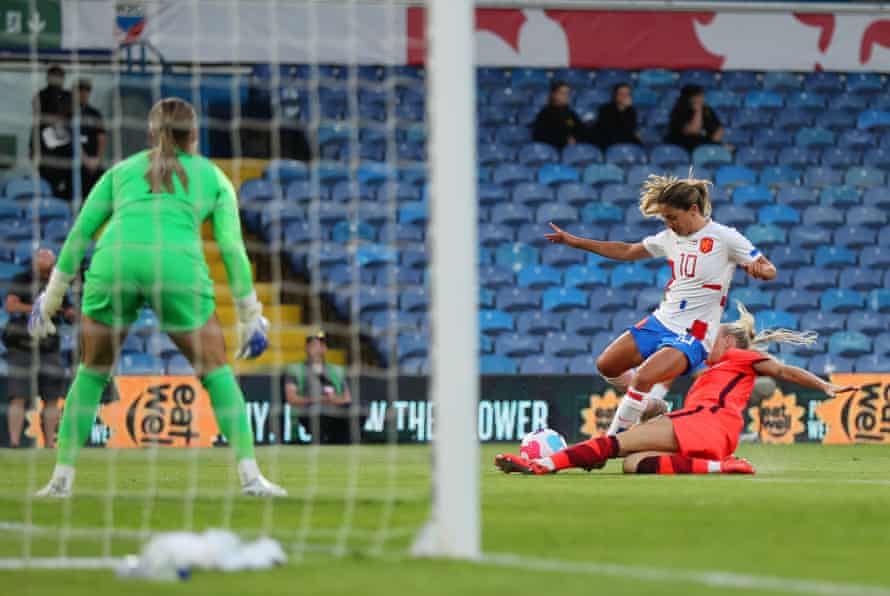 Danielle Van de Donk of the Netherlands is knocked down by England's Alex Greenwood, eventually resulting in a penalty.