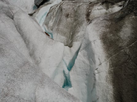 A fissure in the glacier where water has cut a channel