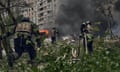 Emergency services fight a fire following a Russian air strike near Kharkiv.