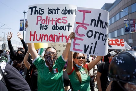 People protest against immigration enforcement policies in Los Angeles, California.