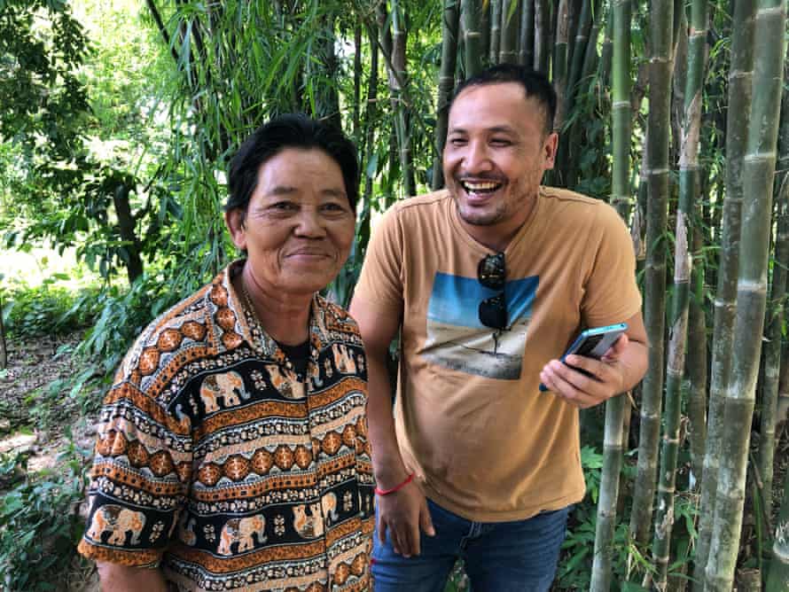 Van 'Pa Vann' Sovann, left, and filmmaker Vanna Hem near Sovann's Kampong Chhnang home