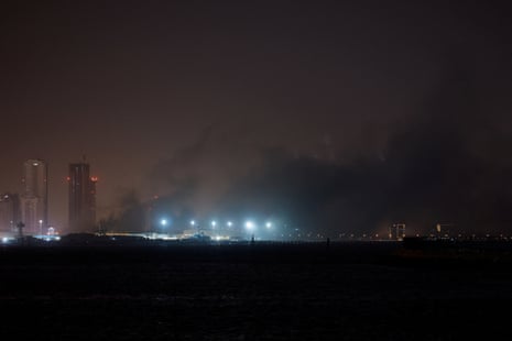 Smoke rises from a US navy base in Bahrain after getting hit by an Iranian strike.