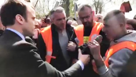 Macron hands his microphone over to a factory worker 