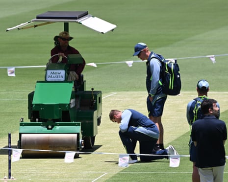 Steve Smith inspects the wicket at the Gabba alongside Australia head coach Andrew McDonald before play on day one of the second Ashes Test