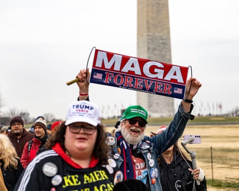 Supporters of the January 6 insurrectionists march near the Washington Monument on their way to a rally held to remember slain J6 attacker Ashli Babbitt, 6 January 2026.
