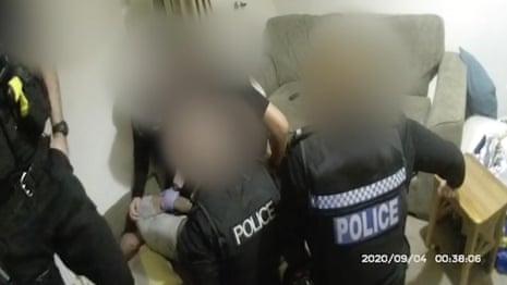‘I can’t breathe’: bodycam footage shows Neal Saunders restrained by police officers – video