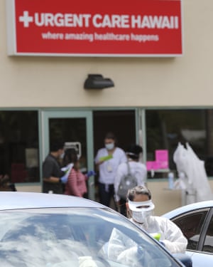 hawaii coronavirus quarantine medical curfews clamps paradise down worker urgent offering clinic talks testing outside drive care person through which