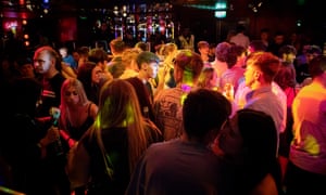 People in Cardiff dance inside Prysm Nightclub last night.