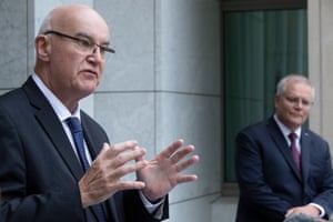 John Skerritt (left) from the Therapeutic Goods Administration announces the approval of the AstraZeneca Covid vaccine at a press conference at Parliament House on Tuesday 16 February.