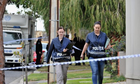 Police outside the home of Phil Walsh on in Adelaide on Friday. 