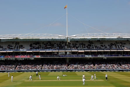 A general view of play against the background of the Grand Stand at Lord’s as James McCollum plays a shot off Jack Leach