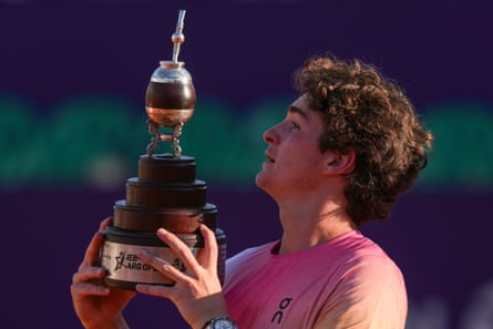 Joao Fonseca looks at the trophy after winning the Argentina Open in February.