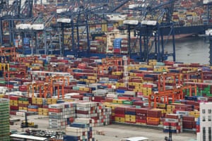 Bank of England warns of increased risk-taking, high leverage and banks’ cloud computing – business live - The Guardian 2 Cargo containers stacked at Yantian port in Shenzhen in China’s southern Guangdong province in June.