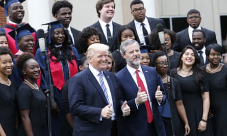 Donald Trump with Liberty University graduates and school president Jerry Falwell on Saturday.