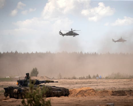 Eurocopters Tiger of the German Army take part in the Lithuanian-German division-level international military exercise 'Grand Quadriga 2024' at a training range in Pabrade, north of the capital Vilnius.