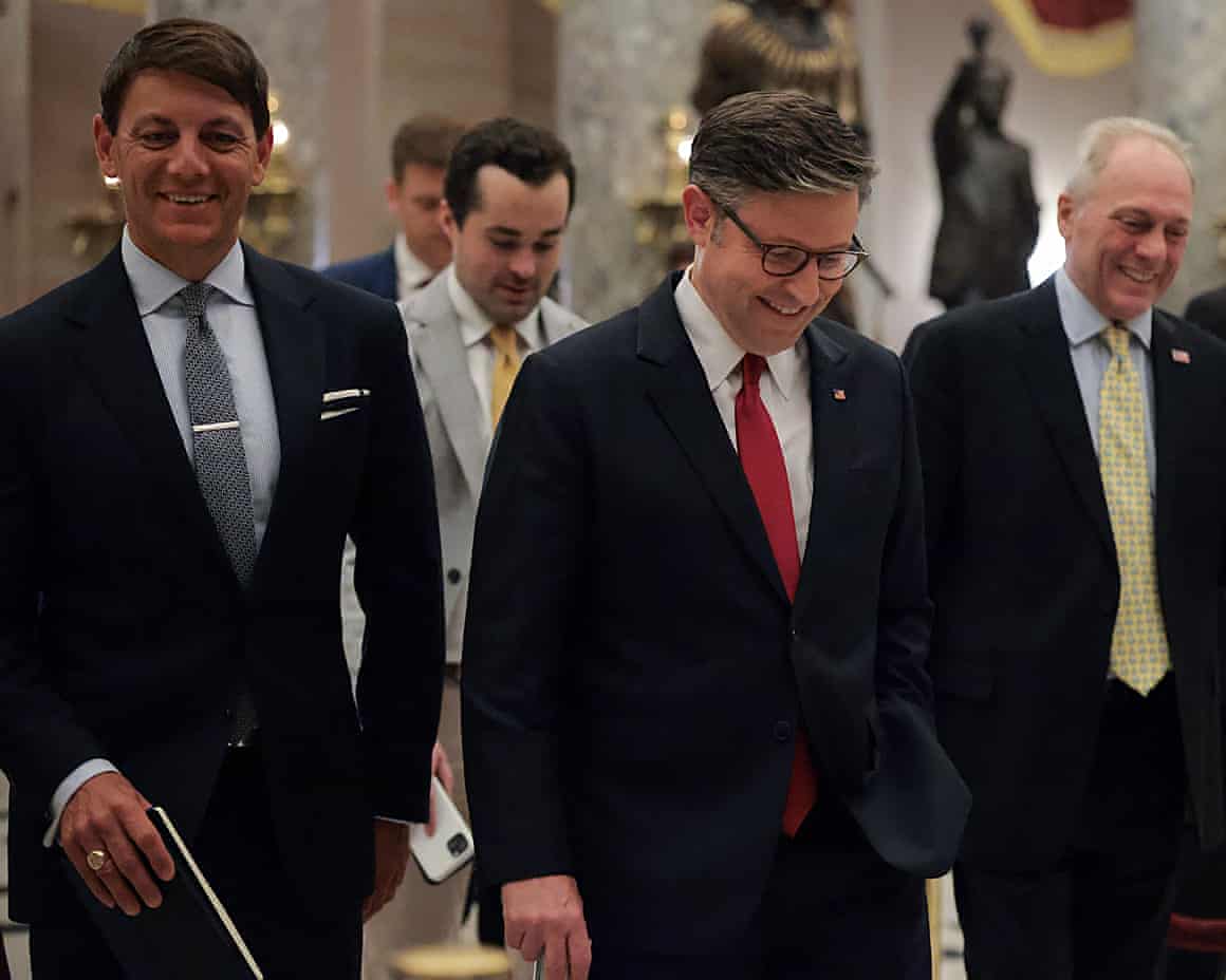 Speaker of the House Mike Johnson, center right, leaves the House Chamber, 2 July.