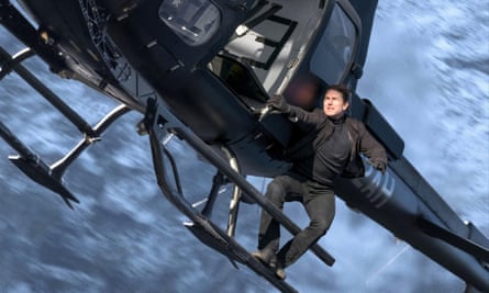 Tom Cruise clings to a helicopter in a scene from 2018’s Mission: Impossible – Fallout