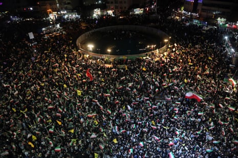 Thousands of people carrying Iranian flags, gathered in Revolution Square to protest against the US and Israel, in Tehran, Iran on April 25, 2026.