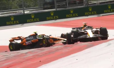 Max Verstappen and Lando Norris collide on the 64th lap.