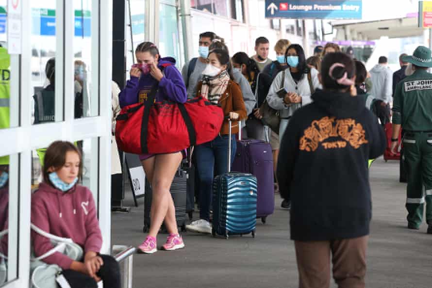 People queue on arrival at Sydney domestic airport ahead of the Easter long weekend.
