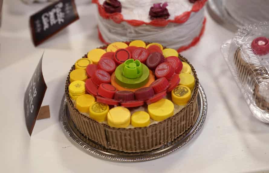 A delicious-looking cake crafted from single-use plastic bags in The Plastic Bag Store, an Adelaide Festival installation by US artist Robin Frohardt.