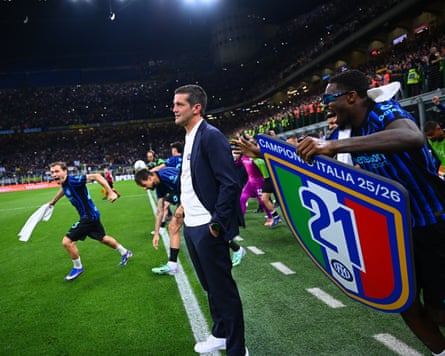 Cristian Chivu is a picture of calm as his Inter players celebrate winning the Serie A title, the club’s 21st Scudetto.