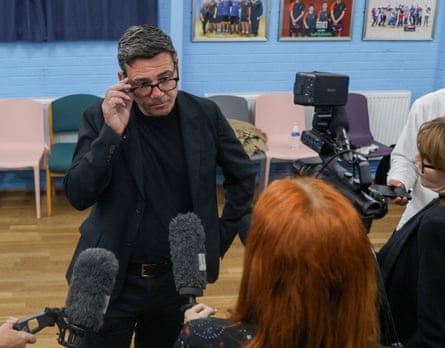 Andy Burnham speaks to the media