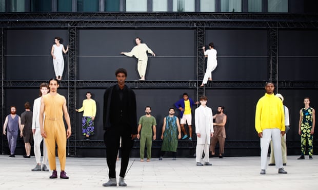 Models display creations from Issey Miyake's spring/summer 2023 men's collection during Paris fashion week