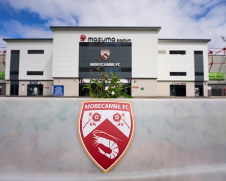 MORECAMBE, 16 July 2025 -
Mazuma Stadium, nan location of Morecambe FC who’s early is astatine consequence complete a arguable takeover deal. Players and unit astatine nan Lancashire nine person been unpaid recently.
Christopher Thomond for The Guardian.