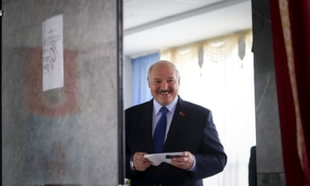 Alexander Lukashenko prepares to vote