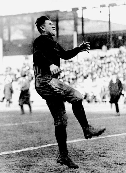 Jim Thorpe of the Carlisle Indian School gets off a kick during warm-ups in a picture from 1912.