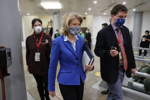 Lisa Murkowski departs at the end of day four of the impeachment trial.