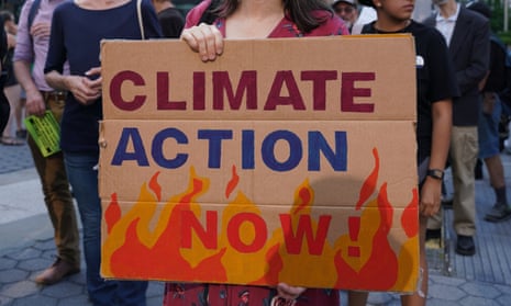 Climate activists, including members of Extinction Rebellion, participate in a demonstration in New York in June against a recent supreme court decision.