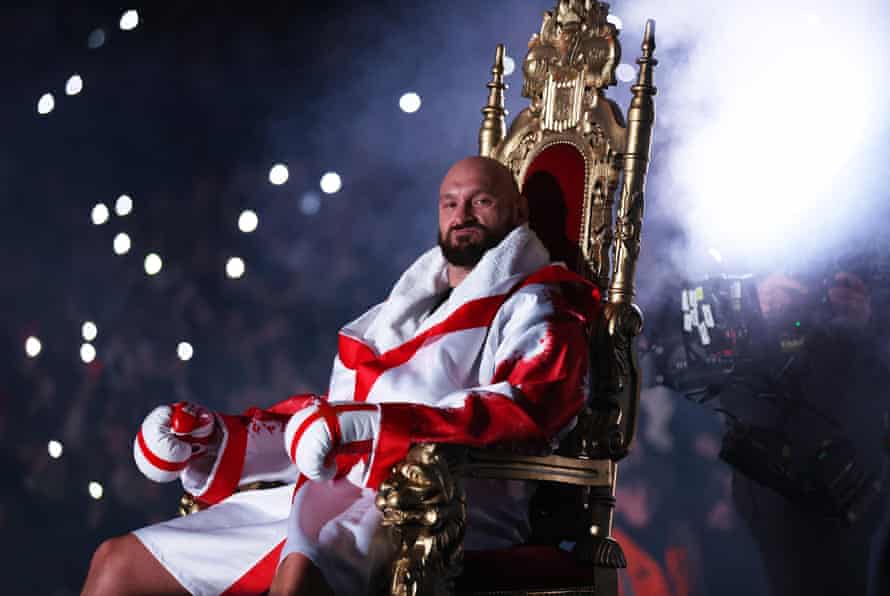Tyson Fury makes their way into the ring.