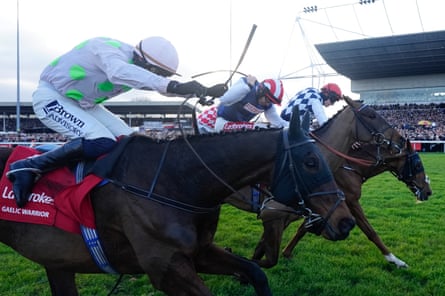 Ben Jones riding The Jukebox Man, centre, to victory in the King George VI Chase at Kempton