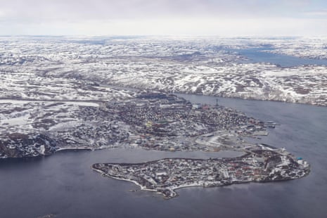 Aerial view of a snow-covered coastline