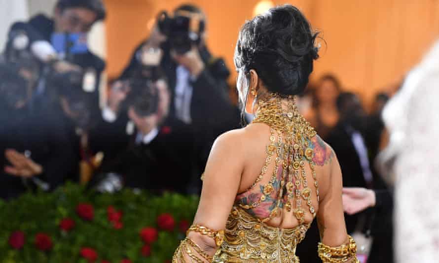 Cardi B faces the cameras.