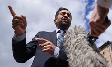First minister Humza Yousaf speaking to the media during a visit to a housing development in Dundee.