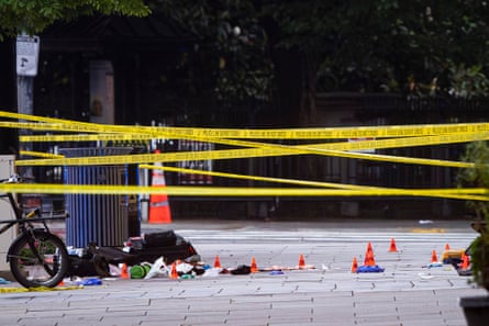 Evidence markers are placed on the ground
