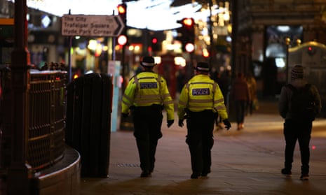 Met Police officers patrol Piccadilly Circus.