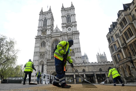 Workers prepare the ground in front of Westminster Abbey.