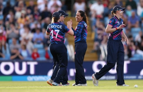 Priyanaz Chatterji celebrates with her teammates after taking the wicket of Heather Knight.